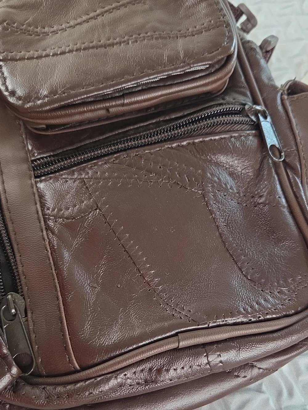 Crossbody MENS SLING BAG.Brown. English Leather PVC. RAIN RESISTANT